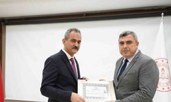 Bakan Özer’den Müdür Sünnetci’ye başarı belgesi